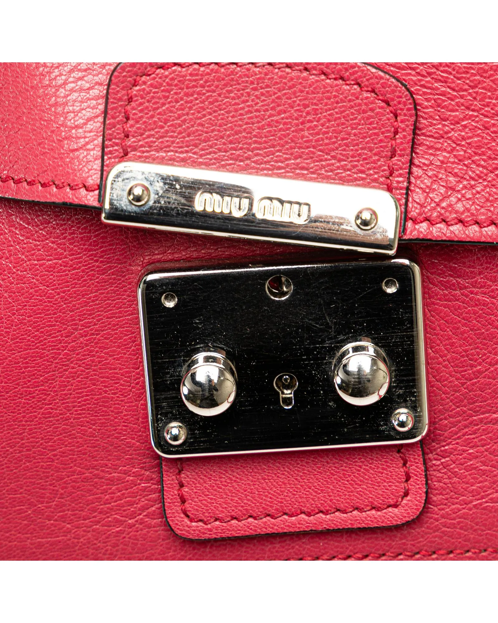 Leather Sound Lock Crossbody with Adjustable Strap and Interior Pockets