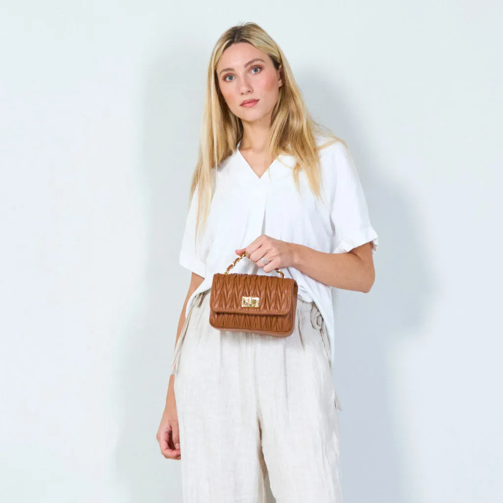 Quilted leather chain handbag with gold accents wholesale